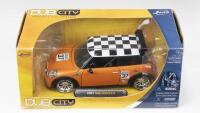 MINI: 1:24 scale JADA Dub City Orange 2007 Mini Cooper S Checkered Roof Raceway #37, boxed.