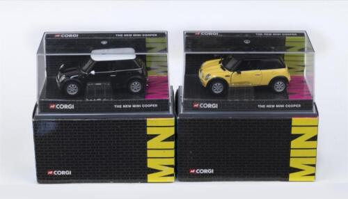 MINI: 2 "new"1:36 scale Corgi Classics Mini Coopers, CC86503 Black with a white roof, and CC86504, Dakar Yellow with a black roof, individually boxed.