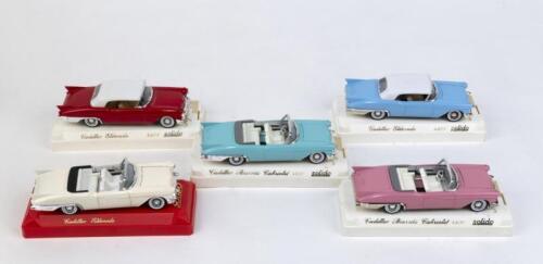 SOLIDO AGE D'OR: 5 1:43 Solido Age d'or Cadillac Convertibles, 1 Pale Blue and White 1955 Eldorado, 1 Red and White 1955 Eldorado, 1 Pink 1957 Biarritz, 1 Pale Green 1957 Biarritz, and 1 Cream 1955 Eldorado.