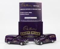 HOLDEN: A gift pack set of two limited edition 1:25 scale Holden FJ Vans Cadbury, with COA numbered 945 of 1512, in fitted box.