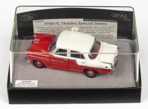 TRAX OPAL: 1:43 Trax Opal Series TO 02D Red and White 2 tone 1958 Holden FC Special 50th Anniversary Sedan, no C of A, clear case in custom box.
