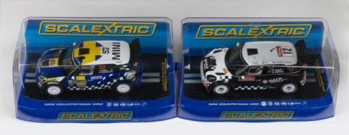 SCALEXTRIC: Set of 2 1:32 Scalextric rally Minis, 1 Countryman WRC, Rally Sweden 2012, and 1 Countryman WRC, Rallye Monte Carlo 2012, no C of A, clear display boxed.