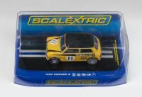 SCALEXTRIC: 1:32 scale Scalextric Black and Yellow Mini Cooper S No 11, 1969 Wipac Trophy Race, Silverstone, no C of A, clear display boxed.