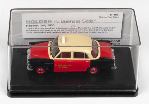 226 · TRAX AUSTRALIAN MOTORING ICONS: 1:43 scale Trax Australian Motoring Icons Series TR40E, Deluxe Red Cabs 1956 Holden FE Business Sedan, clear case, boxed.