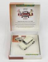 SCALEXTRIC: 1:32 scale Scalextric Wizardry on Wheels White 1959 Morris Mini Minor, Limited Edition No 3730 of 4000, Plaque of Authenticity, clear display case and custom boxed. - 2