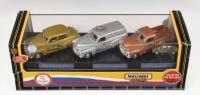 MATCHBOX COLLECTIBLES: 1:43 scale Matchbox Collectibles Limited Edition set of 3 1956 FJ Holdens, commemorating the Australian Olympic Games 1956-2000, 1 Gold FJ Sedan, 1 Silver FJ Van, and 1 Bronze FJ Ute, 1 of 7500 worldwide, clear displayed in custom b