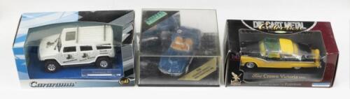 SET OF 1:43 SCALE MODELS: Set of 3 1:43 scale models, 1 Vitesse Blue 1969 Chevrolet Corvette open Convertible, 1 Black and Yellow 2 tone Road Signature 1955 Ford Crown Victoria Coupe, and 1 Cararama Black and White Whisky Hummer H2, all display boxed.
