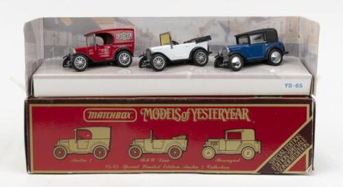 294 · MATCHBOX MODELS OF YESTERYEAR: 1:43 scale Matchbox Models of Yesteryear YS-65 Special Edition Austin 7 Collection, consisting of 3 Austin 7 Models, 1 Red Van, 1 White Convertible with open Black roof, and 1 Blue Sedan with Black roof, custom boxed with display option.