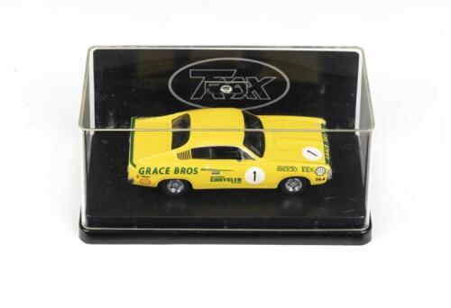 298 · TRAX AUSTRALIAN MOTORING ICONS: 1:43 scale Trax Orignal Autralian Motoring Legends series TR11K Yellow 1973 Ian (Pete) Geoghegan Racing Valiant VH Charger #1, clear display boxed.