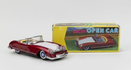 LUCKY TIN: Tin Lucky brand MF 787 friction open Sports Car, Red with White bonnet, friction motor makes noise when front wheels turned, custom boxed.