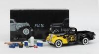 UNIQUE REPLICAS: 1:24 scale Unique Replicas Black with Yellow and Orange flames 1937 Studebaker Pick Up, no C of A, comes with accessories, custom boxed.