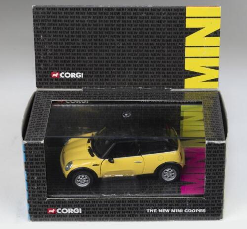 337 · MINI: 1:36 scale Corgi the New Mini Cooper Series CC86504 Dakar Yellow and Black new Mini Cooper, custom display boxed.