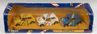 RACING MINIS: Set of 3 1:36 scale Corgi C9 Racing Minis, 1 Blue #7, 1 White #2, and 1 Yellow #5, all with racing stripes, clear display boxed.