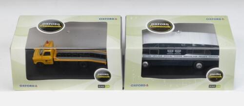 365 · OXFORD COMMERCIALS: Set of 2 1:76 scale Oxford Commercials Series models, 1 Blue, White and Silver BMC Mobile Training Unit, and 1 AA liveried Ford Transit MkI Recovery flat bed vehicle, both custom display boxed.