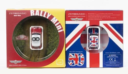 363 · MINI USBS: Set of 2 Zero Basic Mini USB 2.0 drives 4GB capacity, 1 Union Jack liveried 50th Anniversary Mini Cooper, 1 of 2000, and 1 Red and White 1967 BMC Mini Cooper S #177 (1967 Monte Carlo Rally), both clear display boxed, and both containing USB cables and Instruction Manuals.