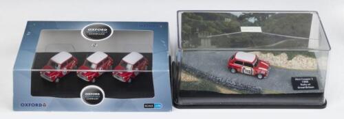 373 · 1:76 MINIS: Set of 3 1:76 Oxford Automobile Company Classic Mini Cooper S Mk.II models, all decorated in red with white roof and sporting their sponsorship colours, Car # 12, registered URX 550G, as driven by Brian Culcheth and Johnstone Syer, Car # 56,URX 560G, driven by John Handley and Paul Easter; and Car # 57, registered OBL 45L and driven by Paddy Hopkirk and Tony Nash, displayed in a custom clear box, and a Hatchette Diorama featuring a red and white Classic Mini Cooper S #113, 1966, in