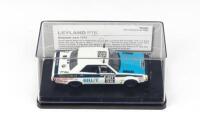 TRAX AUSTRALIAN MOTORING ICONS: 1:43 scale Trax Australian Motoring Icons Series TR42H, White and Blue Leyland P76 1974 Green/Bryson "Big Brut" Word Cup Rally car, clear case, boxed.