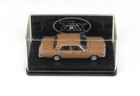 TRAX AUSTRALIAN MOTORING ICONS: 1:43 scale Trax Australian Motoring Icons series TR80 Light Tan 1963 AP5 Valiant Regal Hardtop, clear display boxed.