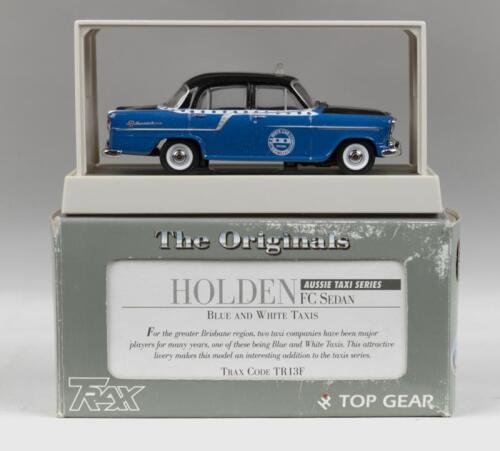 396 · TRAX AUSSIE TAXI SERIES: 1:43 scale Trax Aussie Taxi Series TR13F Blue and White Taxis 1958 Holden FC Sedan, boxed.