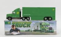 B.P: Battery Operated 1:36 scale B.P. Transforming Truck, in traditional B.P. Green & Yellow livery, includes bonus accompanying miniature car, transforms into a B.P. Service Station, features working headlights and taillights and sounds, boxed, working 