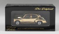 TRAX 50TH ANNIVERSARY: 1:43 scale Trax Original TRG15 Gold Plated 50th Anniversary Commemorative Model 1948 Holden 48-215 ("Golden Holden") sedan, clear display boxed.