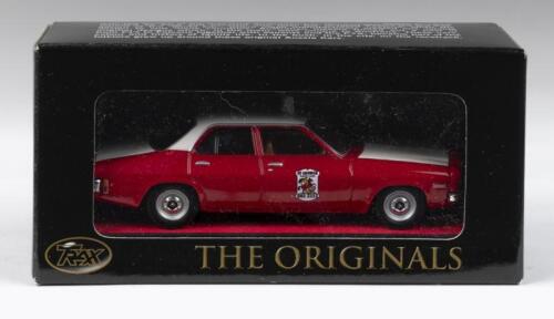 TRAX AUSSIE TAXI SERIES: 1:43 scale Trax Australian Motoring Legends Originals Aussie Taxi Series TR17G Red and White 1972 Holden HQ Belmont St George Taxi, clear display boxed.