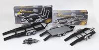 TRAILERS: Set of 4 Black and Silver trailers, consisting of 1 boxed Metal Max 1:18 scale metal trailer, 1 boxed Metal Max 1:24 scale metal trailer, 1 unboxed Sunnyside 1:24 scale metal trailer, and 1 unboxed unknown brand, unknown scale plastic trailer. V