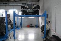 HOIST: A four post 240v hydraulic&nbsp;vehicle hoist 3600kg load capacity, complete with approach ramps and moving dollies. [Location: Mount Waverley] - 8