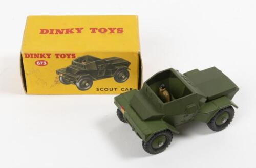 21 · SCOUT CAR: A Dinky Toys No. 673 Scout Car, in original box made in England By Meccano Ltd
