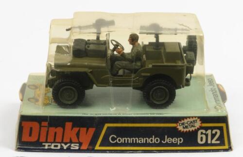 COMMANDO JEEP: A Dinky Toys No.612 Commando Army Jeep in original plastic bubble packaging, Jeep complete with driver, guns and jerry cans fitted