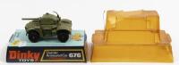ARMOURED CAR: A Dinky Toys No. 676 Daimler Armoured Car with Speedwheels, in original plastic bubble packaging made in England by Meccano Ltd
