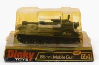 MOBILE GUN: A Dinky Toys No. 654 155mm. Mobile Gun Tank, complete with plastic missiles within original plastic bubble packaging, made in England by Meccano Ltd