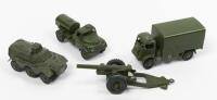 DINKY TOYS: A collection of four Dinky Toys including a Armoured Personnel Carrier, Army Wagon, Army Water Tanker and a Howitzer, made in England by Meccano Ltd&nbsp;