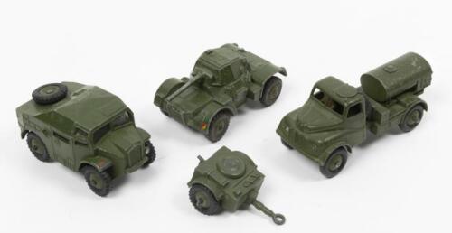 DINKY TOYS: A collection of four Dinky Toys including a Field Artillery Tractor, Armoured Car, Army Water Tank, Trailer, made in England by Meccano Ltd