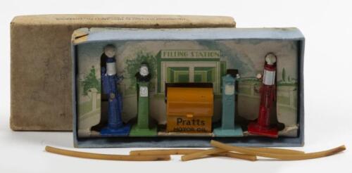 PETROL PUMPS: A Dinky Toys No. 49 Petrol Pumps Set comprising of four petrol pumps and one bread bin in pratts motor oil livery, pumps with original hoses not attached, in original box made in England by Meccano Ltd