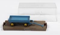 DINKY TOYS HAND CART TRAILER: A Dinky Toys hand cart trailer, finished in blue with yellow hubs, made in England, Meccano ltd&nbsp;