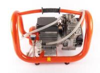 VACUUM PUMP: A Husqvarna Model VP200 core drill electric vacuum pump