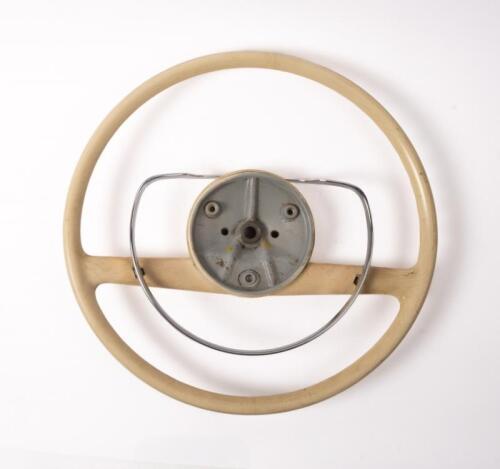 STEERING WHEEL: A circa 1960s ivory coloured and chrome steering wheel in original condition (W108, W109,W111,W113) believed to fit some Pagoda models.