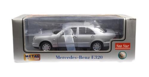 MERCEDES BENZ E320: A 1:18th scale mercedes benz E320 model car, manufactured by sun star models in original box