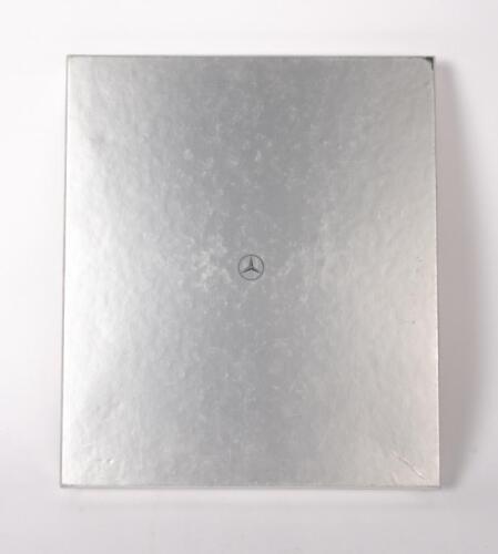 MERCEDES-BENZ BOOK: A Mercedes-Benz SLK Stainless Steel book, book cover with some scratches, book case in good condition with shelf wear
