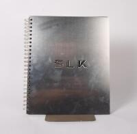 MERCEDES-BENZ BOOK: A Mercedes-Benz SLK Stainless Steel book, book cover with some scratches, book case in good condition with shelf wear&nbsp; - 2