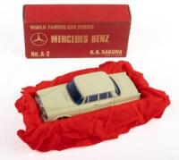 MERCEDES BENZ 220 SEDAN: A Mercedes Benz 220 sedan model car, a cream coloured sedan with blue tinted windows, product number A-2, manufactured by K.K.Sakura