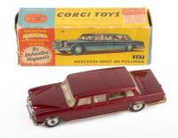 MERCEDES BENZ 600 PULLMAN CORGI TOYS: A mercedes benz 600 pullman, finished in dark red paintwork, this model has the operating windscreen wipers, glidamatic spring suspension, model number 247, manufactured by Corgi toys