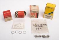 BRAKE PARTS: A group of brake parts suitable for various Aston Martin models. Brake reaction strut shims (Part No. 122105), brake booster clamps for Aston Martin DB4 & Lucas Girling, Girlock parts