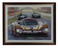 LE MANS: A print featuring the 1988 Le Mans Jaguar XJR-9 'Silk Cut Jaguar' #2, by Michael Turner titled 'The winning Jaguars at Le Mans' framed and glazed, 63.5cm wide, 50cm high overall.