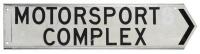 ROAD SIGN: 'Motorsport Complex' black lettering on white road sign