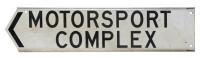 ROAD SIGN: 'Motorsport Complex' black lettering on white road sign - 2