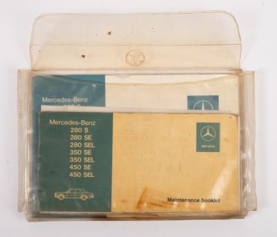W116 450SE: A collection of Mercedes-Benz manuals and booklets for a Mercedes-Benz W116 450SE including maintenance booklet, owners manual, service list, vehicle delivery sheet and car care brochure.