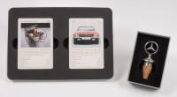 MERCEDES-BENZ: Two official Mercedes-Benz items of memorabilia including wine&nbsp;stopper in form of radiator badge & sealed cards.