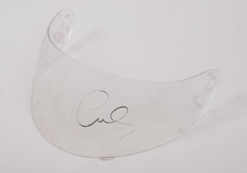 LEWIS HAMILTON: A perspex helmet visor with Lewis Hamilton signature in black marker. Visor 27cm wide.